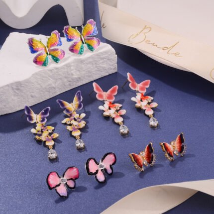 High-end new color butterfly earrings for women, trendy mismatched tassel enamel drop earrings wholesale
